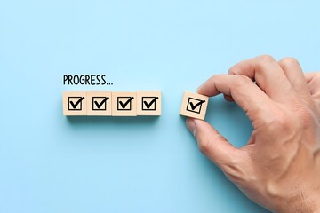 Checklist and task progress tracking concept. A hand placing the final checkmark on wooden blocks in a progress bar, task completion, productivity, goal setting, and efficient project management.