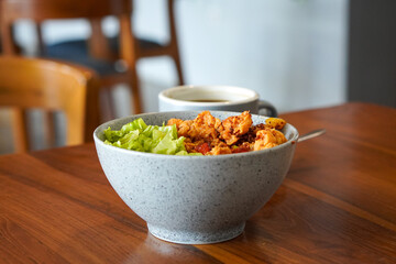 Chicken spicy garlic, captured on May 20, 2025. Crispy chicken tossed in a bold garlic sauce with spicy chili, delivering a savory and fiery flavor in every bite