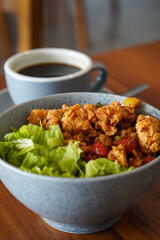 Chicken spicy garlic, captured on May 20, 2025. Crispy chicken tossed in a bold garlic sauce with spicy chili, delivering a savory and fiery flavor in every bite