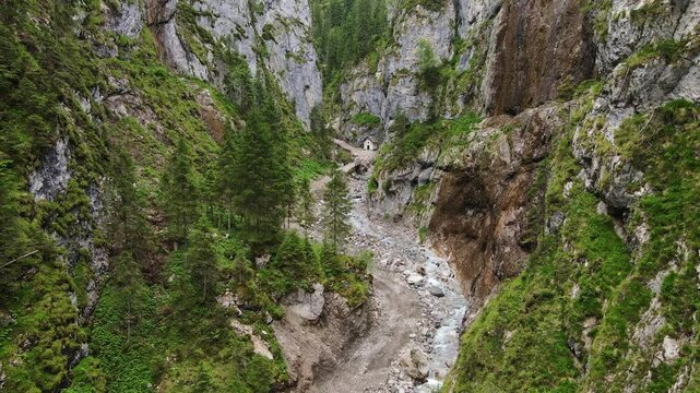 Mountain trail near Chiesa San Antonio winding through rocky canyon in Italy