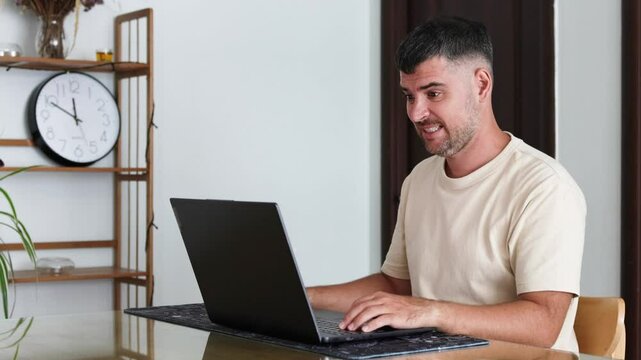 The programmer clutches his head in frustration.