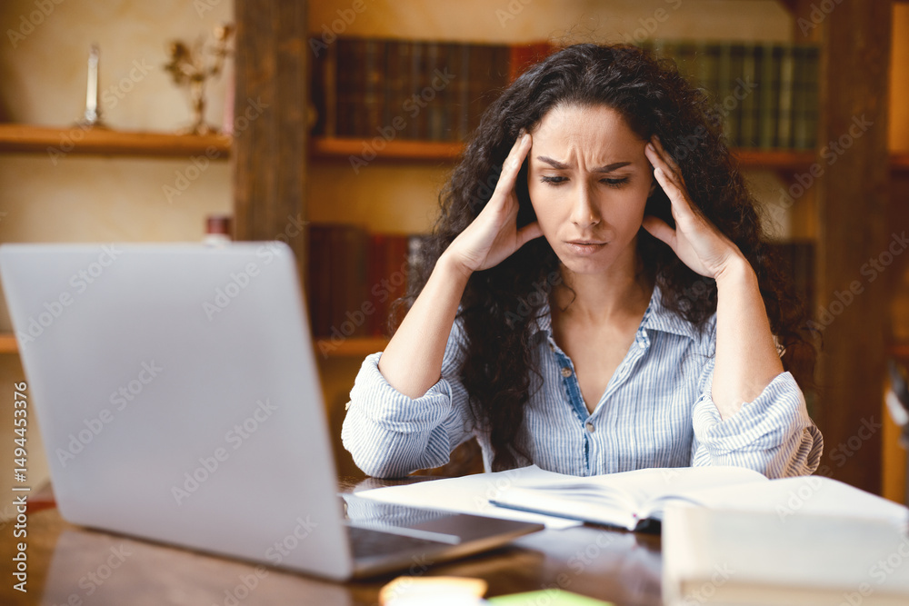 Poster fatigue from work. tired young woman feeling headache or stress, touching and massaging her temples,