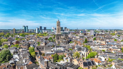 Utrecht town аerial drone view from above, typical Dutch city skyline, Utrecht cityscape with tower, canals and houses, Holland, Netherlands