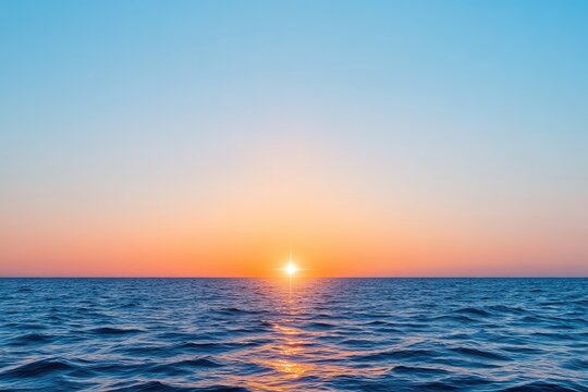 Sunset over calm ocean