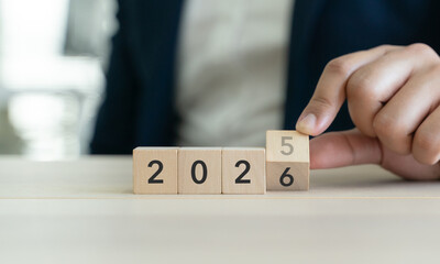 Transitioning from 2025 to 2026 with wooden blocks. Challenge target business for the upcoming...