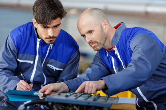 picture of production engineering professionals at work