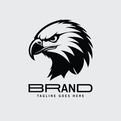 Obraz premium Black and white eagle head logo design for a brand. Bold profile view of an eagle head in a clean, modern graphic design.