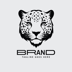 Leopard head logo design in black and white. Graphic logo design with a sleek, modern aesthetic, featuring a detailed depiction of a leopard head against a plain background.