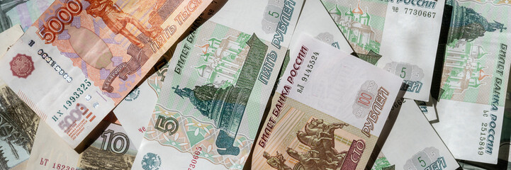 Paper banknotes of Russian rubles in a stack. Web banner