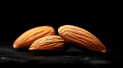 Close up of three almonds