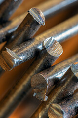 Stack of steel rods with rough cuts, close-up view