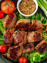 shashlik with tomatoes, herbs and mustard