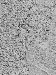 Closeup of a Textured Concrete Surface with Granular Details.