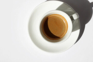 Coffee. Cup of Freshly Brewed Espresso on White Background. 