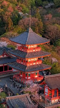 Aerial drone view of the Kiyomizu-dera temple at sunset in Kyoto, Japan