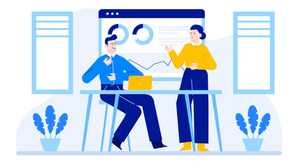 Two people discussing charts and graphs in a business meeting setting