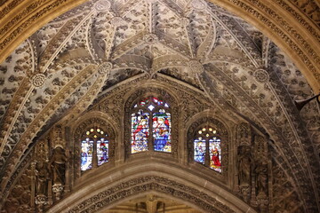 Obraz premium The stained glass window in the Cathedral of Seville, Andalusia, Spain 