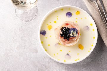 A traditional dish in Peru, ceviche, elegant appetizer of fresh fish in lime sauce leche de tigre, black caviar