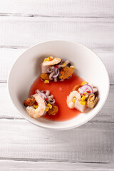 A traditional Peruvian dish is seafood ceviche, mixed ceviche, assorted, octopus, mussels, shrimp