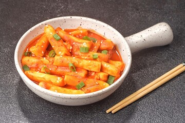 Tteokbokki is a Korean dish of rice flour cooked in spicy and sweet gochujang seasoning