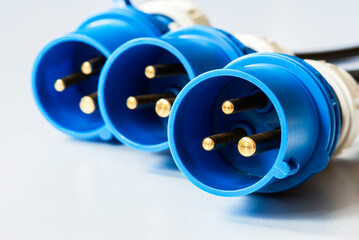 Set of AC power plug connectors, close-up view