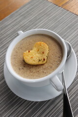 moshroom soup in a white bowl 
