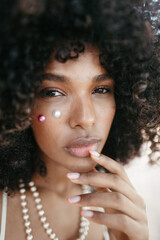 Afro Style Portrait of a Confident Fashionista Laughing with Glamour and Attitude. Smiling.