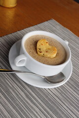 moshroom soup in a white bowl 