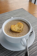moshroom soup in a white bowl 