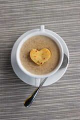 moshroom soup in a white bowl 