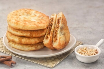 Hotteok is a pancake filled with bean paste, sold as a South Korean street food.