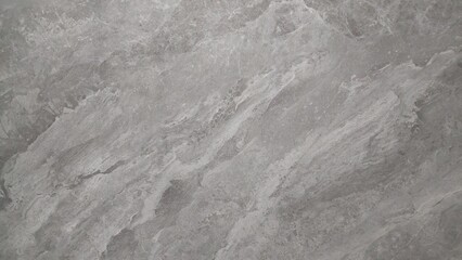 Fototapeta premium Close-up of a marble surface with patterns, ideal for use as a background, texture, or design element in architecture and interior decor.