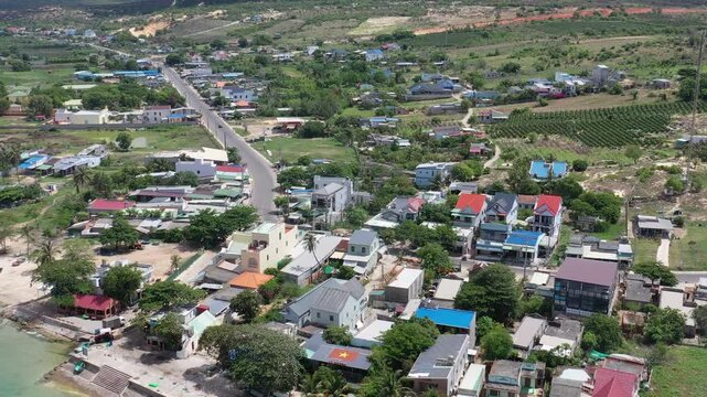 Binh Thuan, Vietnam May 18, 2025 4k Aerial video of boats on Binh thuan coast near Ke Ga Lighthouse	