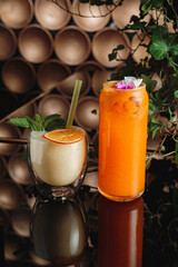 Cocktails with berries and syrup