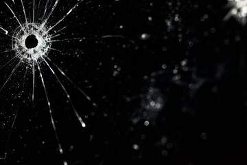 Bullet holes on black glass, overlay design background