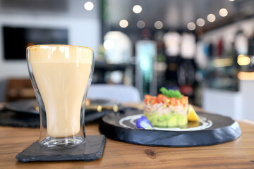 cappuccino, coffee in a clear glass cup in a cafe, soft color background food and drink, hot drink