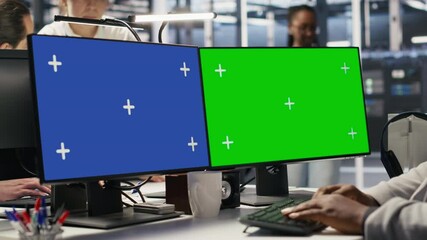 Data center engineer using green screen PC to monitor neural network AI. Server room employee using chroma key computer to oversee rigs powering machine learning processes, camera A - Powered by Adobe