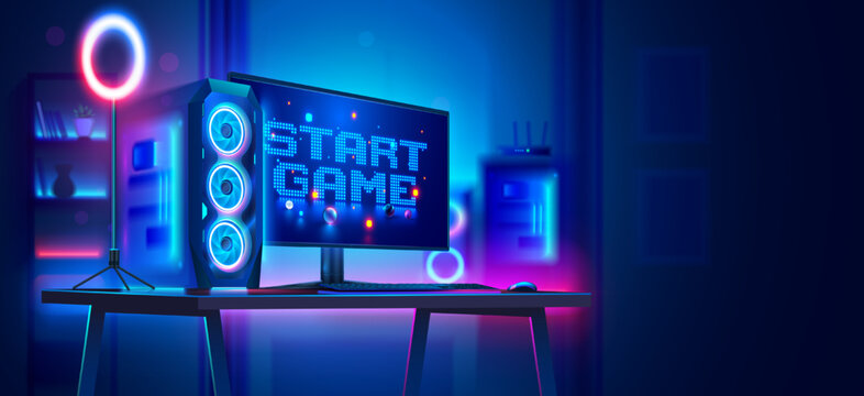 Powerful gaming computer on the table with the inscription the start game on the monitor. Gaming computer in an empty dark room in neon light. Nobody at the computer. Desktop PC for video game.