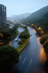 A rainy day in a city with a long road and tall buildings. The road is wet and cars are driving down it