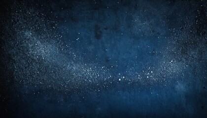Obraz premium Dark blue textured background with white specks