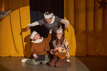 Smiling Kids Acting out Funny Scene on Stage of Inclusive Children Theater
