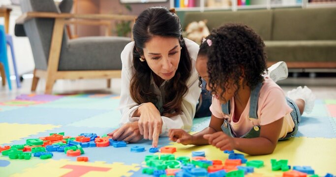Psychologist, child and letters toys in office for mental health, examination or progress. Woman, pediatrics and girl for wellness, speech therapy or consultation for patient support or development