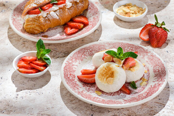 cottage cheese cheesecakes with strawberries, croissant with strawberries and mascarpone 