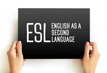 ESL - English as a Second Language acronym, text concept on card for presentations and reports