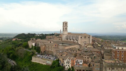 Obraz premium Europe Italy, Umbria , Perugia : drone aerial view of St. Peter's ( San Pietro )Basilica and Abbey church cathedral in downtown of Perugia city. Tourist attraction religious destination in Umbria 