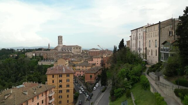 Europe Italy, Umbria , Perugia : drone aerial view of St. Peter's ( San Pietro )Basilica and Abbey church cathedral in downtown of Perugia city. Tourist attraction religious destination in Umbria 