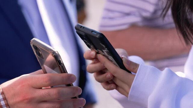 Contactless payment with smartphone. Sharing contact information through smartphones. Sending and receiving information with smartphones. Communication and Connection. Scan QR code.