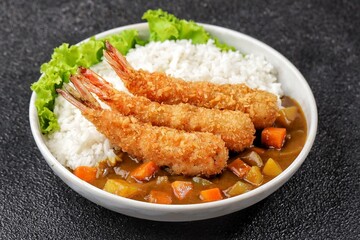 Ebi Fry Curry Don. Crispy and golden panko-crumbed prawns, coated in a thick curry sauce and served with rice,