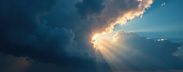 Fototapeta premium Sunbeam explodes through dark storm clouds, vibrant blue sky visible , contrast, atmospheric