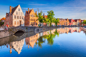 Bruges, Belgium. Spiegelrei canal, sunrise water reflection in Brugge.